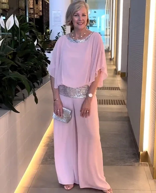 Stilla | Elegant aftenensemble: Glitrende top og palazzo bukser