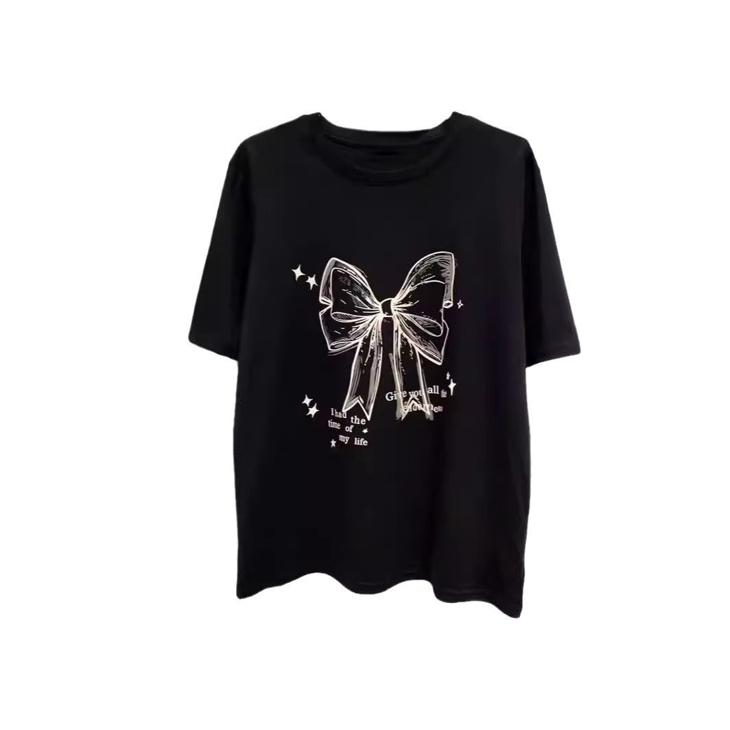 Dame T-shirt med legende båndmotiv og inspirerende slogan Stilla