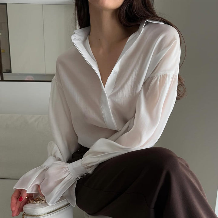 Dame Elegant Bluse med voluminøse Puffærmer og fint Strukturdesign Stilla