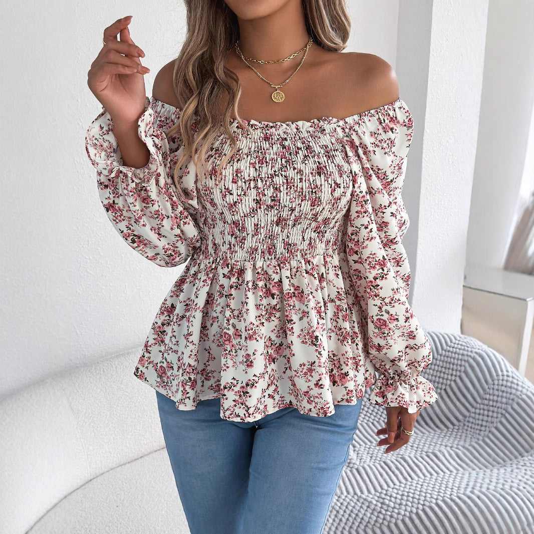 Damebluse med bred pasform og florale detaljer Stilla