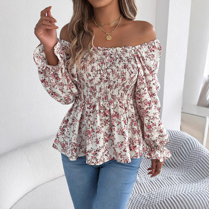 Damebluse med bred pasform og florale detaljer Stilla