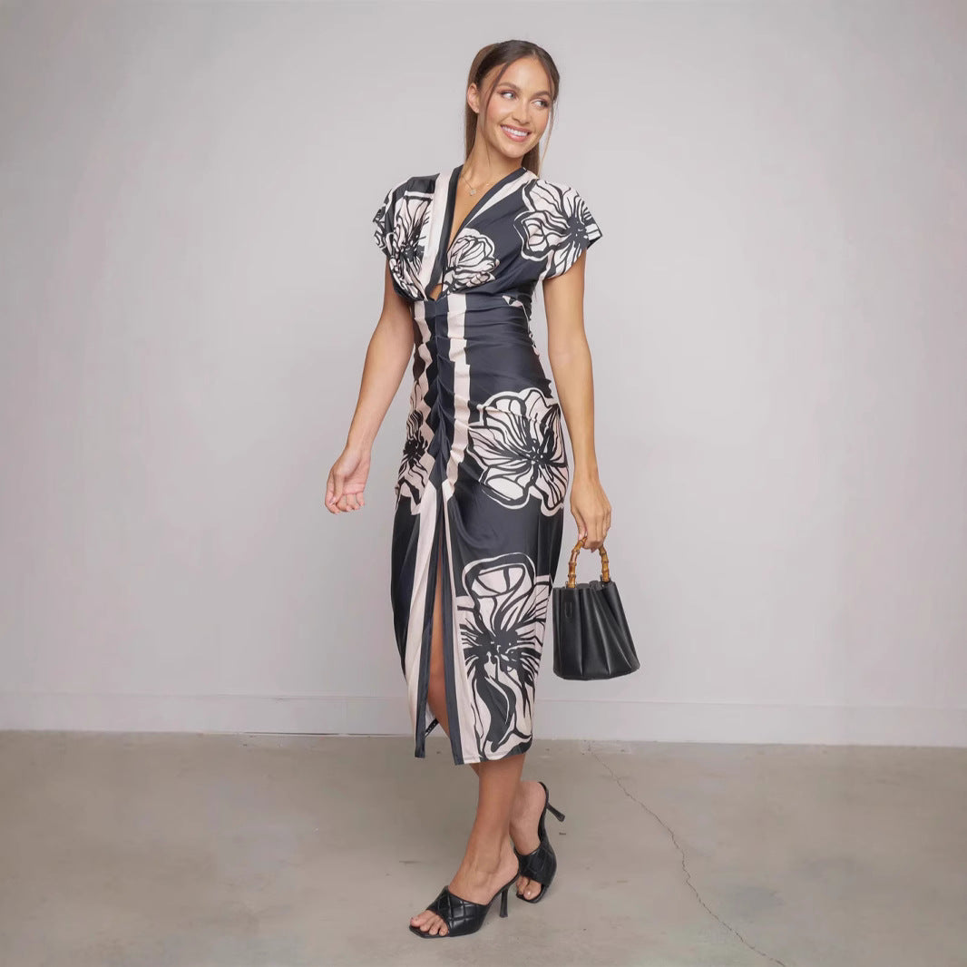 Dame Midi-kjole med blomstret design og elegant split Stilla