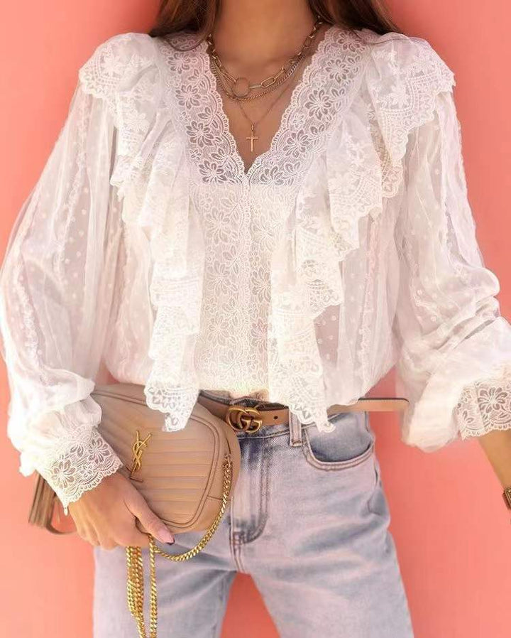 Dame elegant bluse med spetskant og flæsedetaljer Stilla