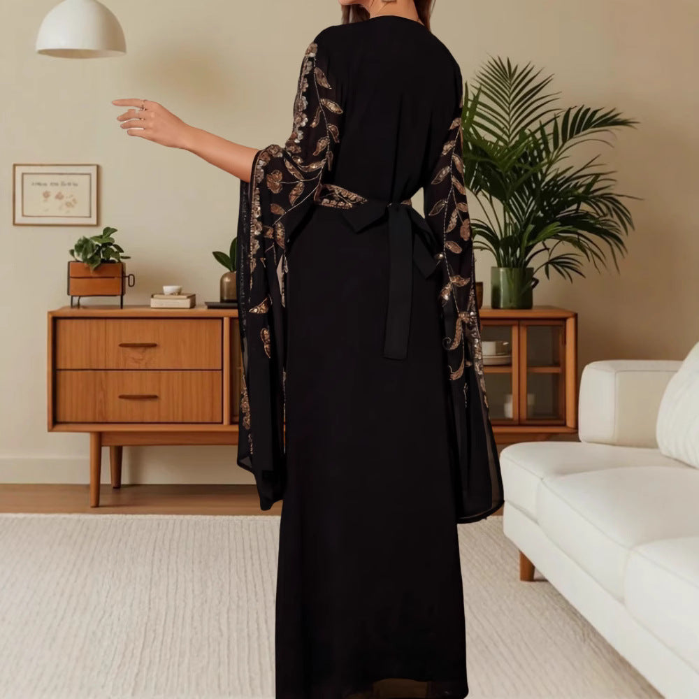 Dame maxikjole med elegant broderidesign og flydende ærmer Stilla