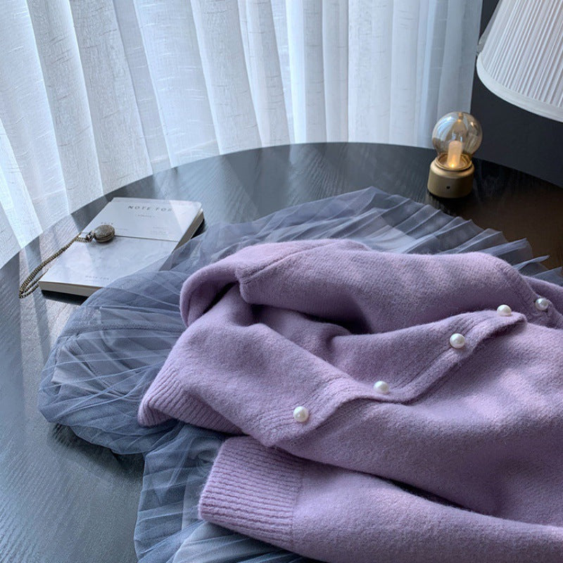 Kvinders cardigan med elegante perleknapper og moderne design Stilla