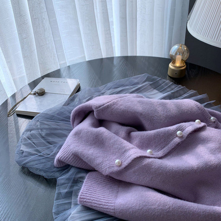 Kvinders cardigan med elegante perleknapper og moderne design Stilla