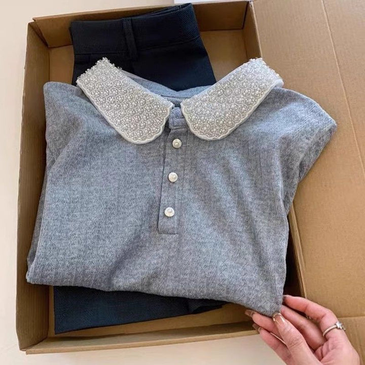 Dame polo top med elegant krave Stilla