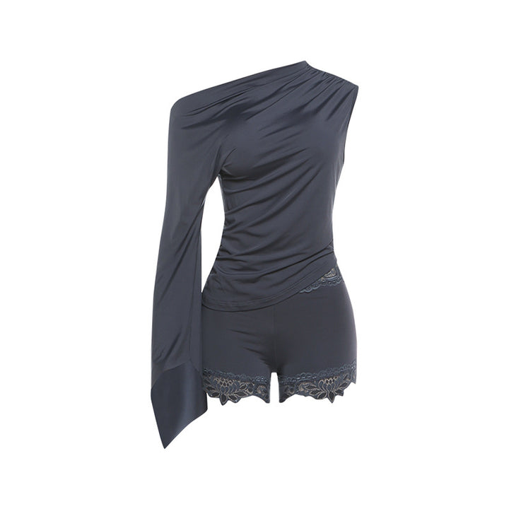 Dame jumpsuit med asymmetrisk snit og elegant ærmedesign Skovae