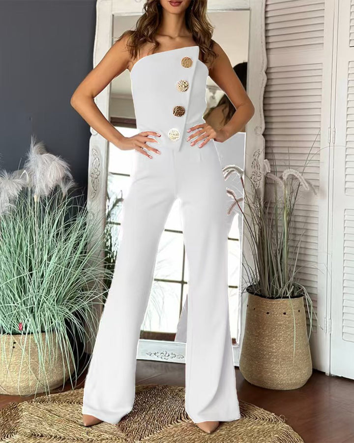 Dame overalls med asymmetrisk snit og dekorative knapper Stilla