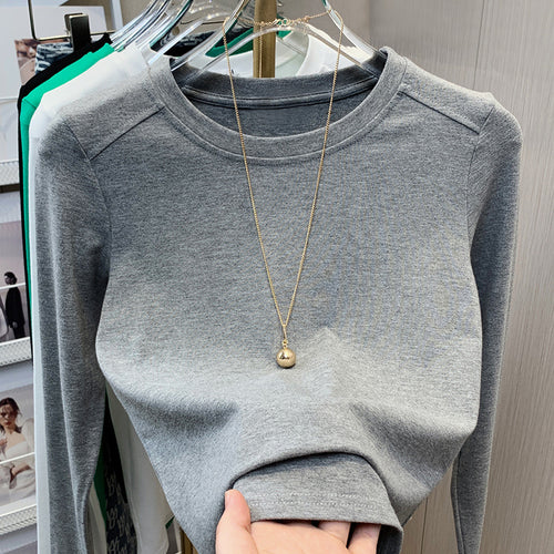 Dame Elegant og tætsiddende Langærmet T-shirt med Rundhalsetud Stilla