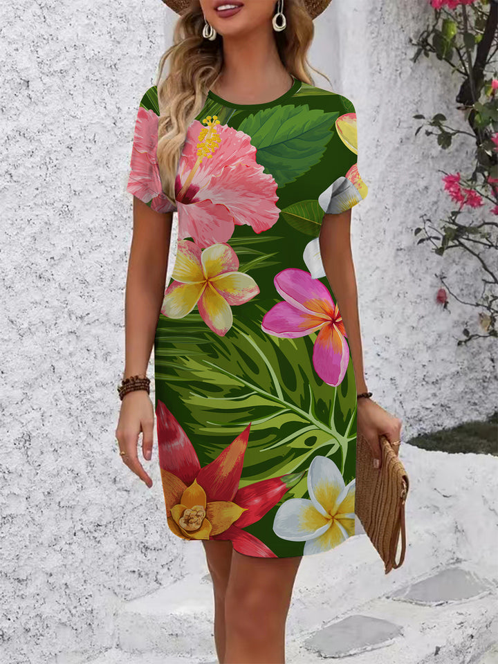 Dame afslappet T-shirt kjole med farverigt blomsterprint og behagelig pasform Skovae