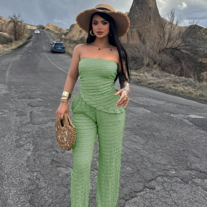Dame elegant jumpsuit med off-shoulder design og asymmetrisk kant Skovae