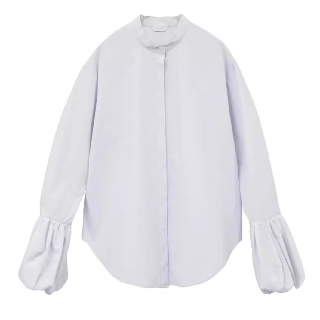 Kvinders elegante bluse med voluminøse ærmer og stående krave Stilla