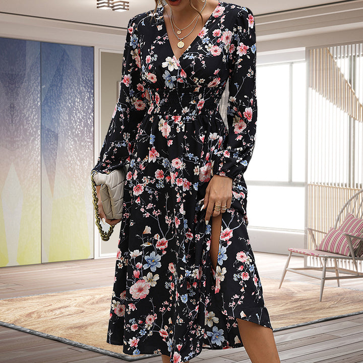 Dame maxikjole med blomsterprint og svajende kant Stilla