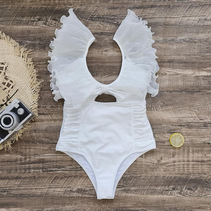 Dame one-piece badedragt med voluminøse flæsedetaljer og elegant V-udskæring Stilla
