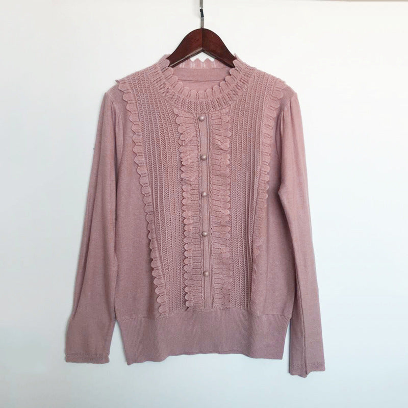 Dame elegant strikpullover med flæse detaljer og perleknap lukning Stilla