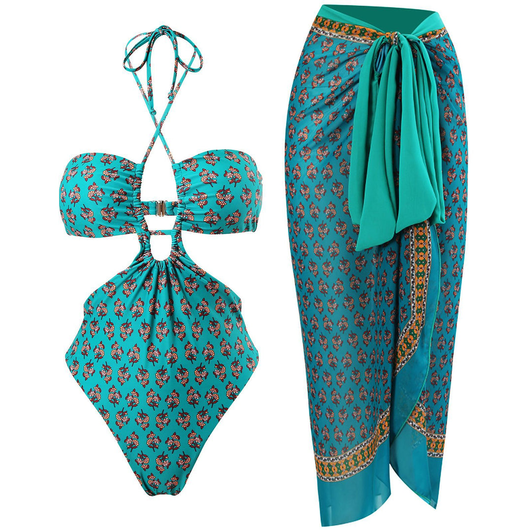 Dame badedragt med moderne snit og matchende sarong Stilla