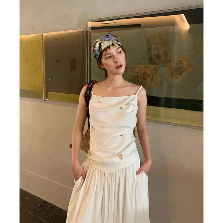 Dame top med raffinerede knapdetaljer og elegant drapering Stilla