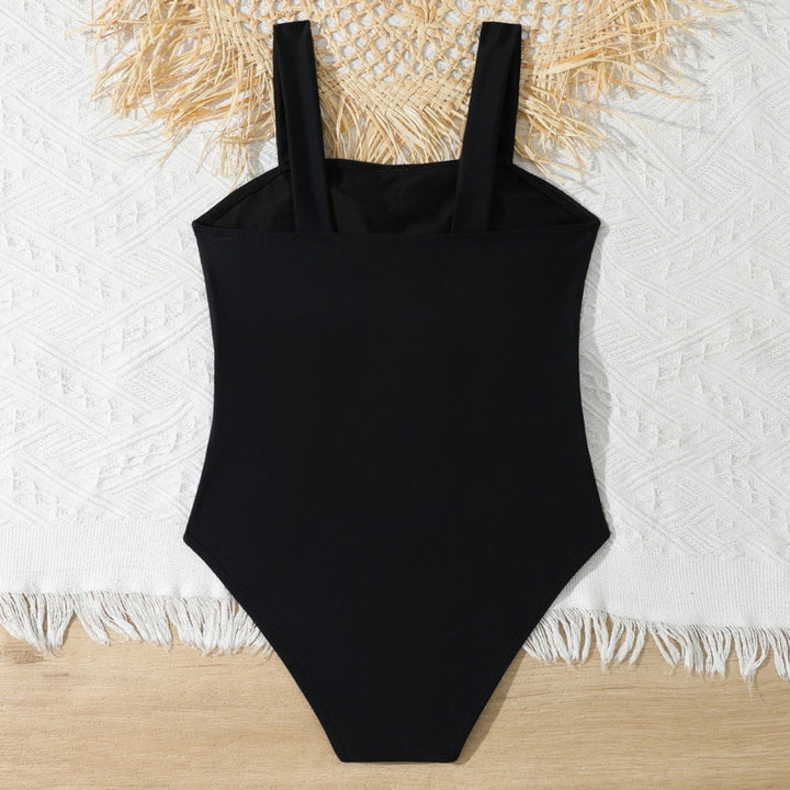 Dame heldragt badedragt med raffinerede cut-outs og moderne skulderstropper Stilla