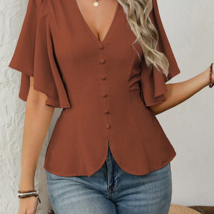Damer elegant bluse med klokkeærmer og knapdetalje Skovae