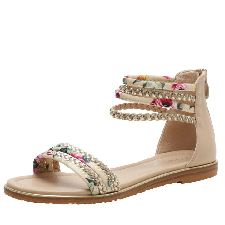 Dame fodsandaler med florale accenter og stilige flettede stropper Stilla