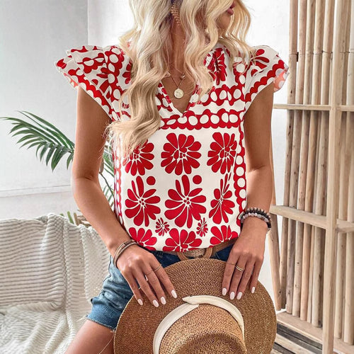Damebluse med florale flæsedetaljer og frisk design Stilla