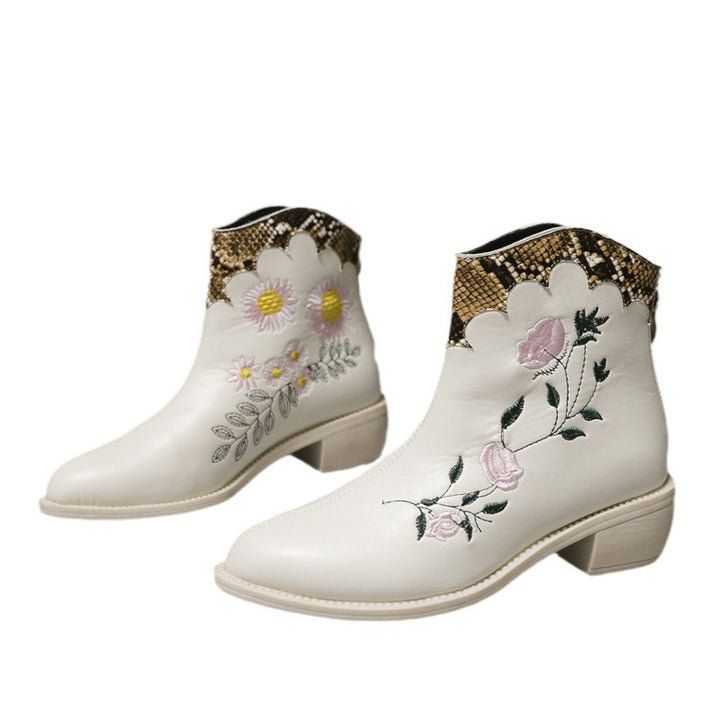 Dame støvler med blomsterbroderi og elegant slangeprint Stilla