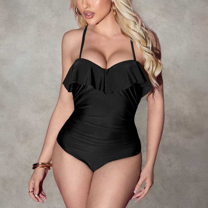 Dame one-piece badedragt med flot ruffle detalje Skovae
