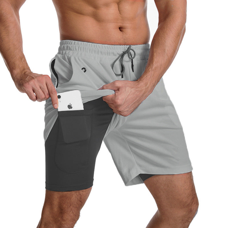 Herrer Sportslige Hybrid-shorts med praktiske lommer og åndbart materiale Stilla