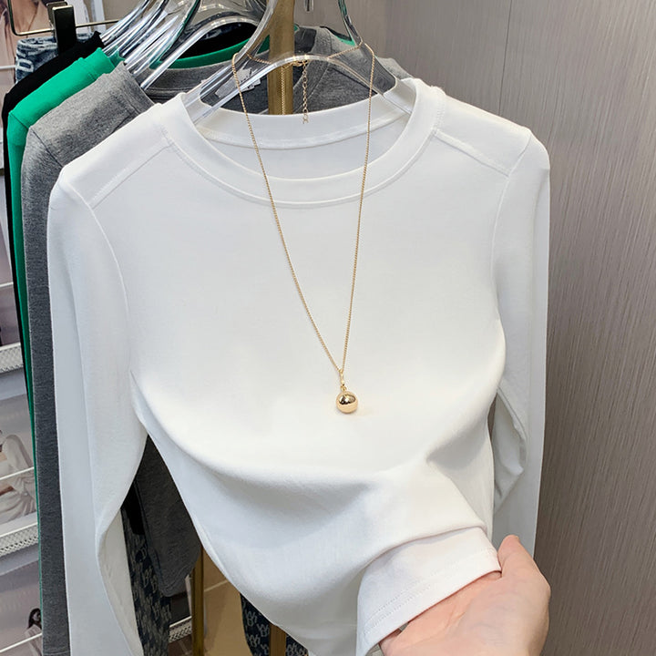 Dame Elegant og tætsiddende Langærmet T-shirt med Rundhalsetud Stilla