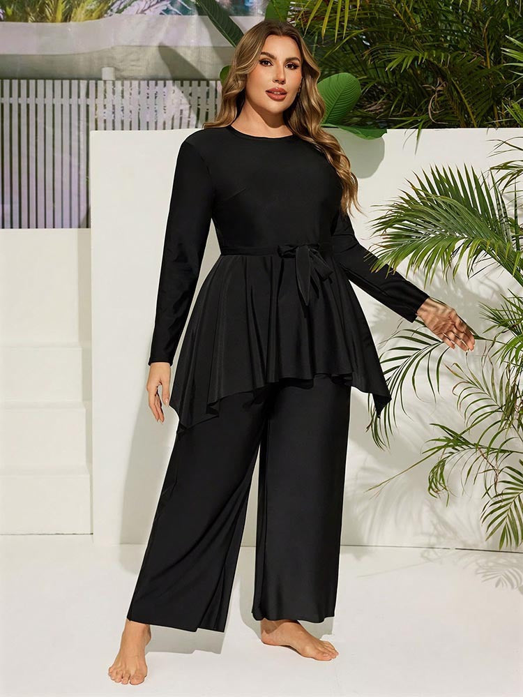 Dame elegant strandoutfit med blomsterbinding og vid snit Skovae
