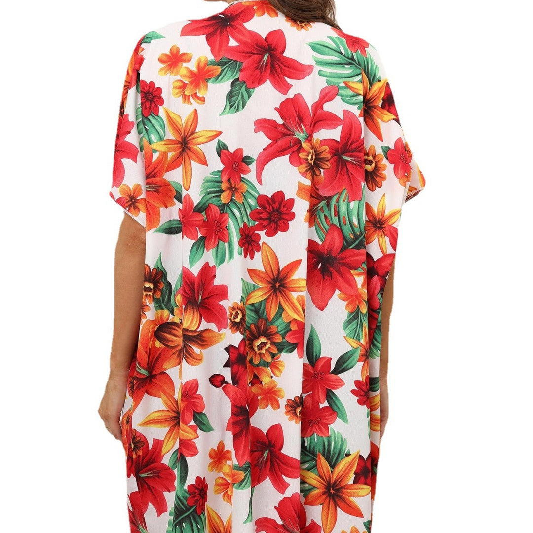Damer let strandkimono med blomsterdesign og luftig, åben silhuet Stilla