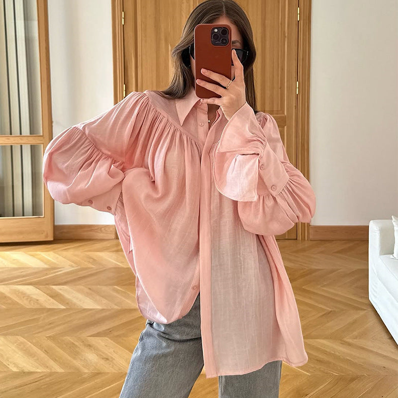 Dame oversized bluse med voluminøse ærmer og elegant knaplukning Stilla