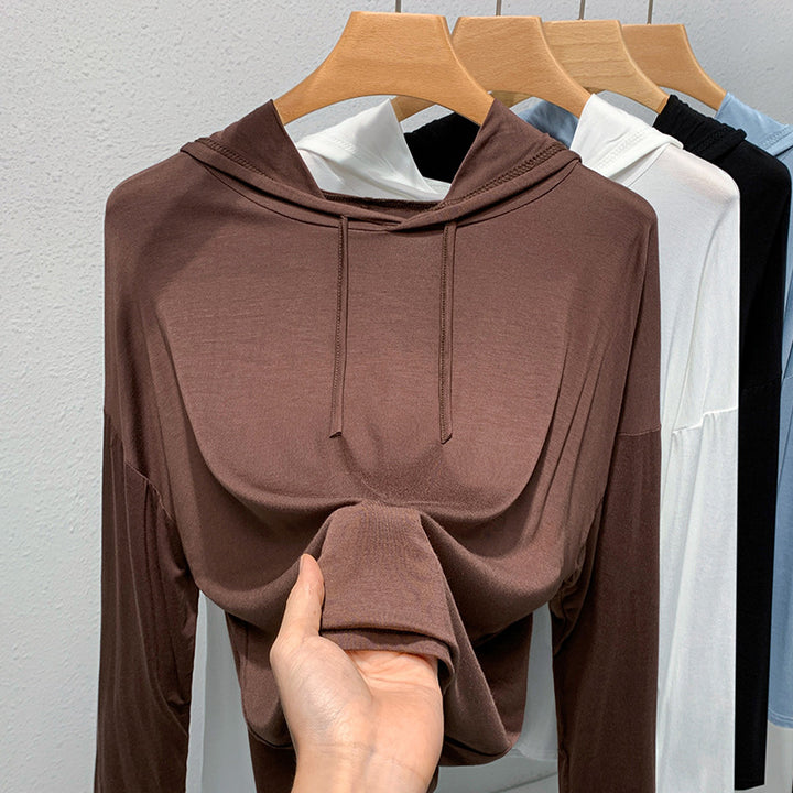 Dame hoodie med afslappet pasform og åndbart materiale Stilla