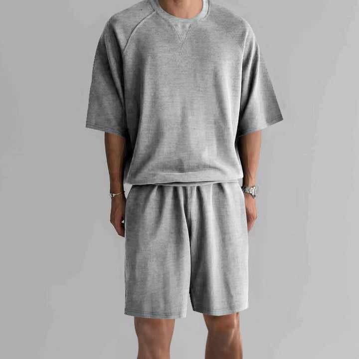 Herrer afslappet sportoutfit med løs pasform og åndbart materiale Stilla