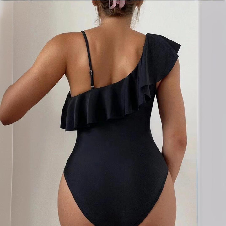 Dame badedragt med asymmetrisk flæse-design og gennemskinnelige indsatser Stilla