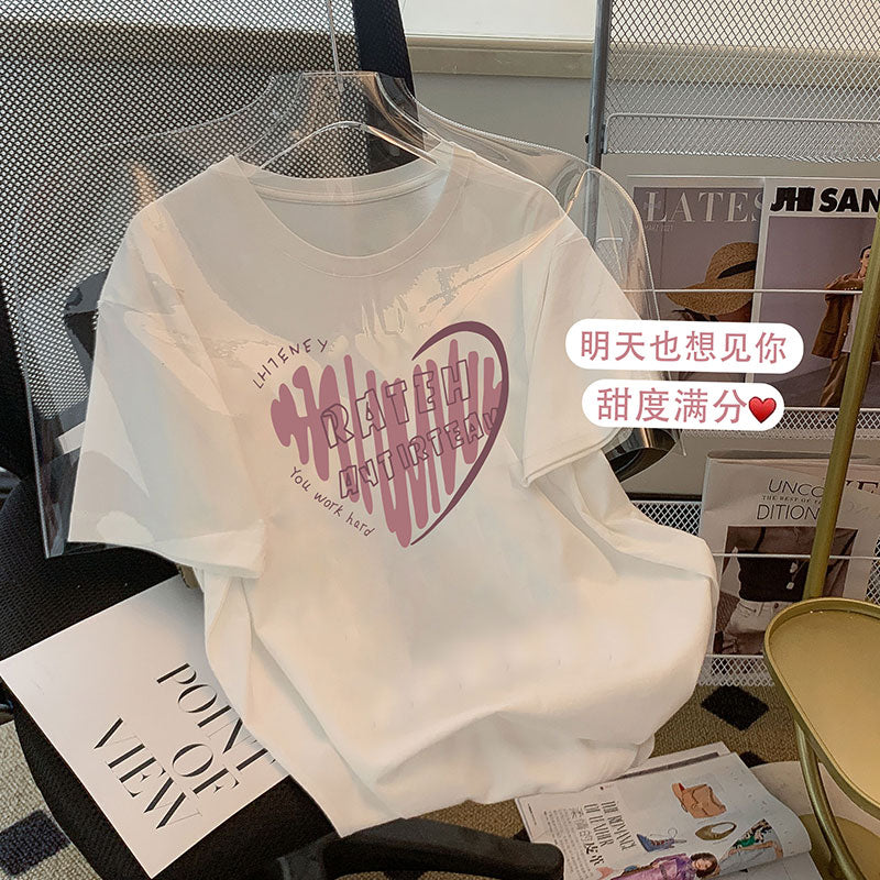 Dame T-shirt med kreativt hjerte motiv og inspirerende tekst Stilla