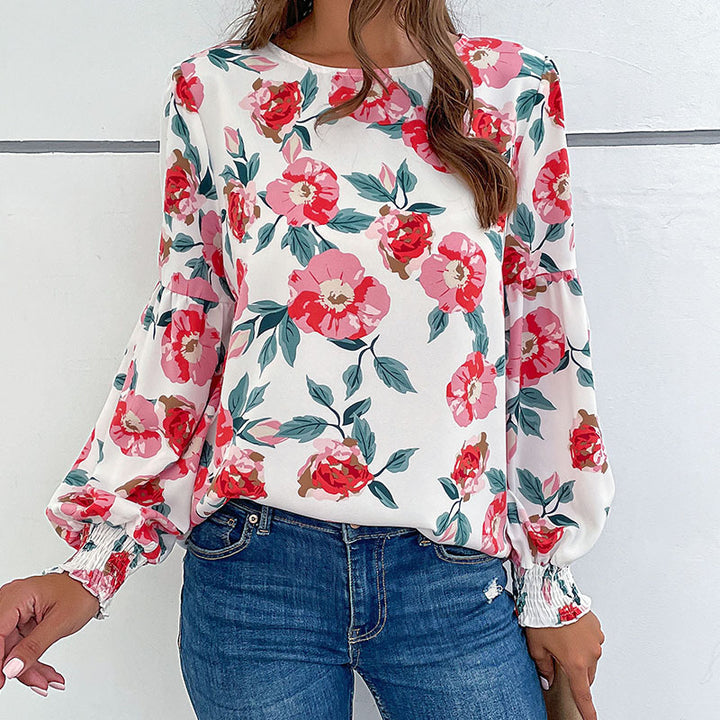 Damebluse med blomstertryk og voluminøse ærmer Stilla