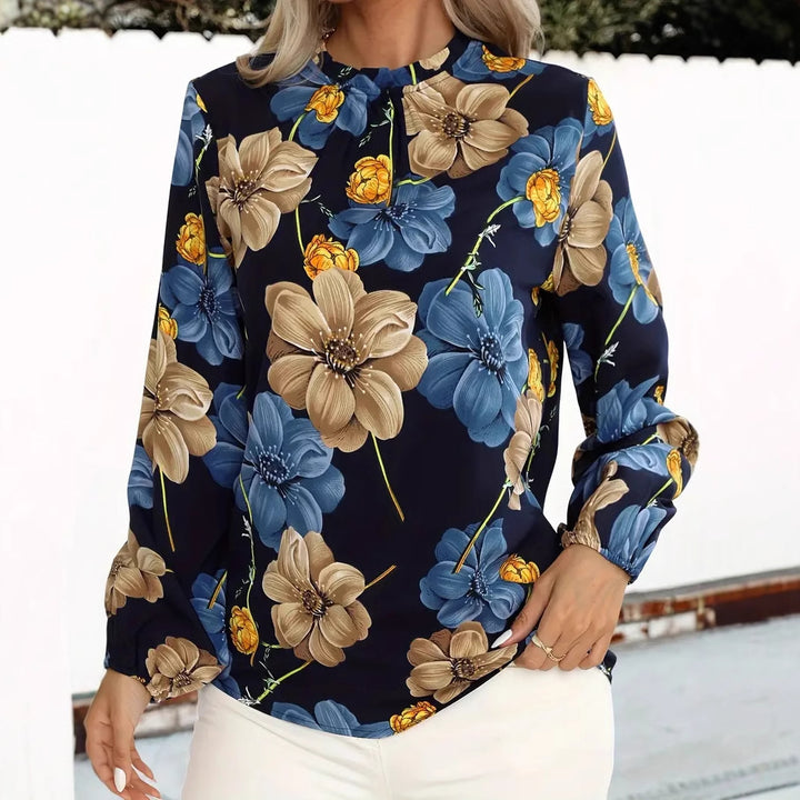 Damebluse med blomsterdesign Stilla