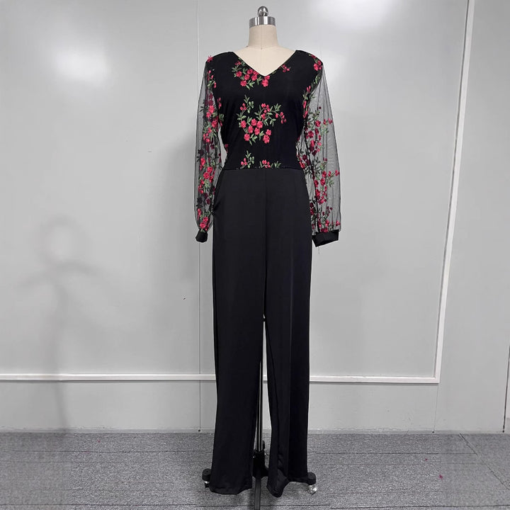 Dame jumpsuit med blomster spid top og vidde ben Stilla