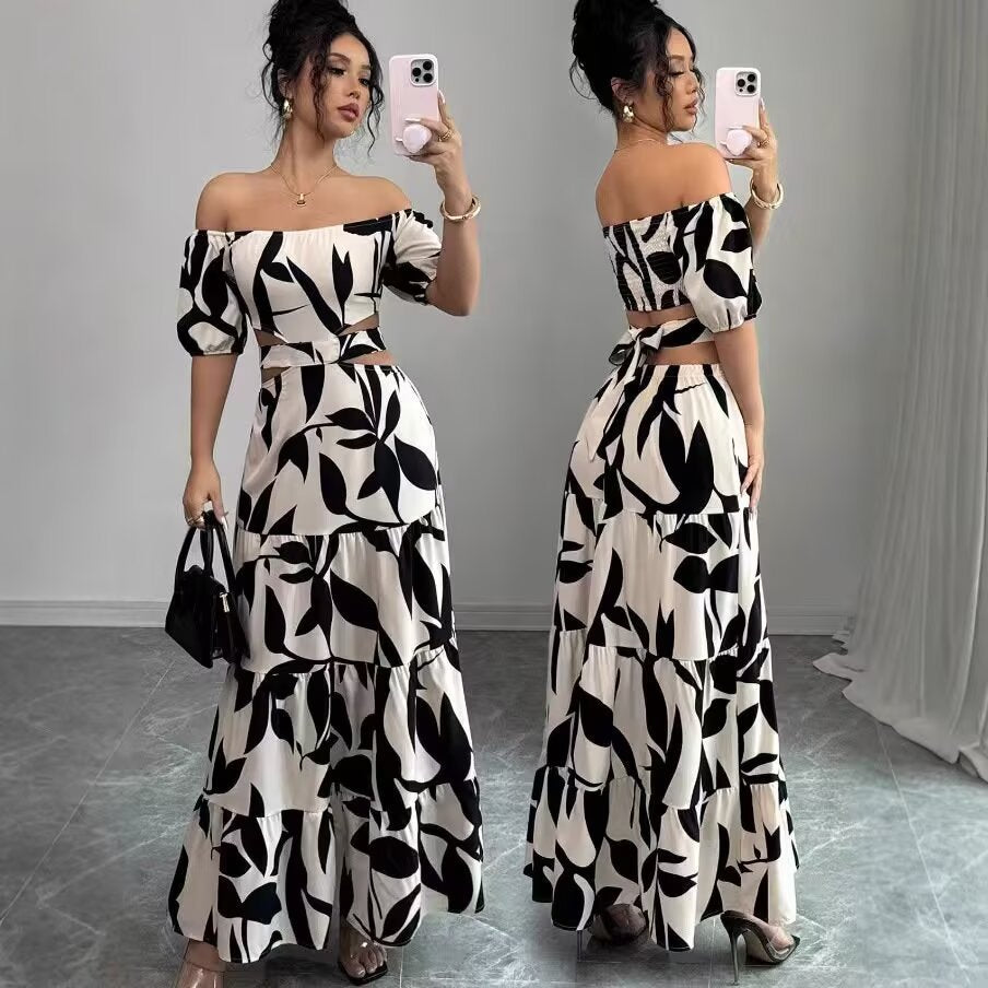 Femme Off-Shoulder Floral Maxi Kjole med lagdelt design Stilla