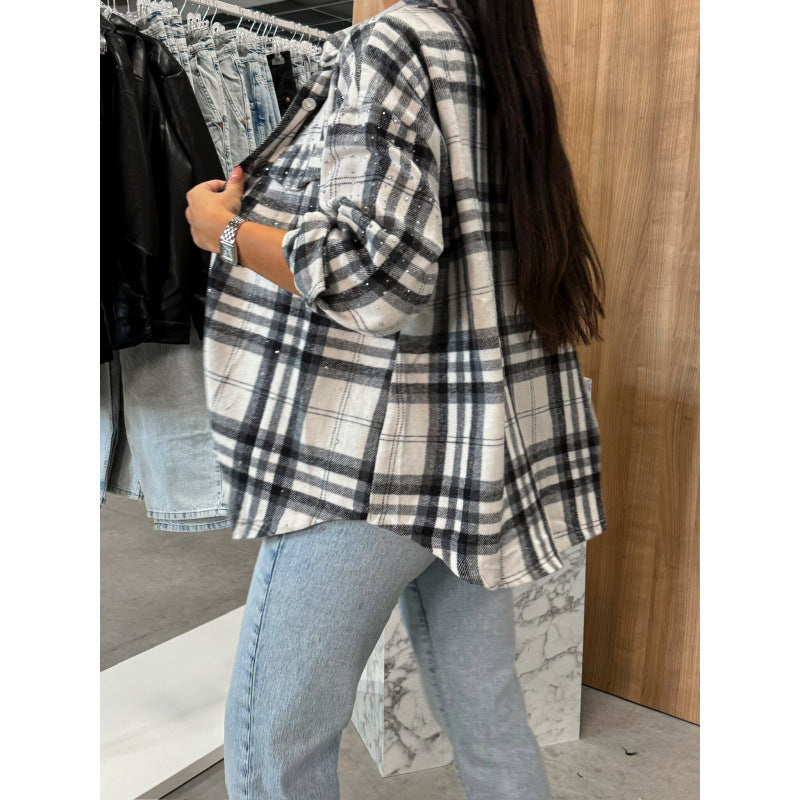 Kvinders afslappede ternet bluse i en oversized pasform med praktiske brystlommer Stilla
