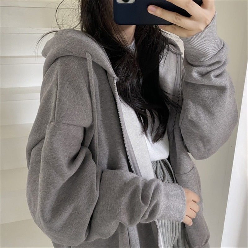 Femme Oversized Zip-Up Hoodie med justerbar hætte Stilla