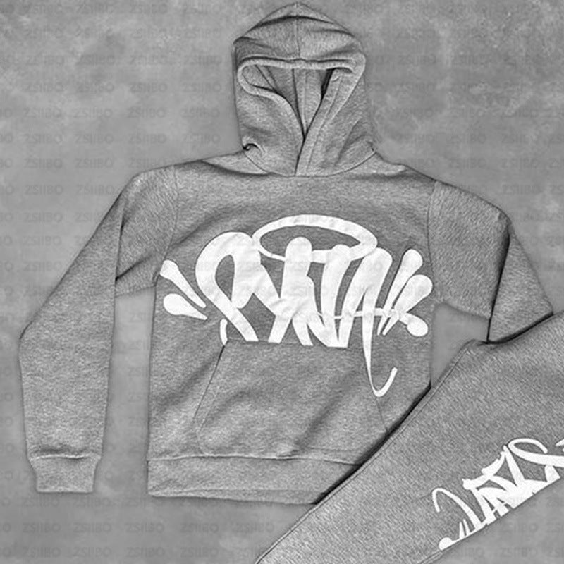 Damens hoodie med kreativ graffiti design og praktiske kengurulommer Skovae