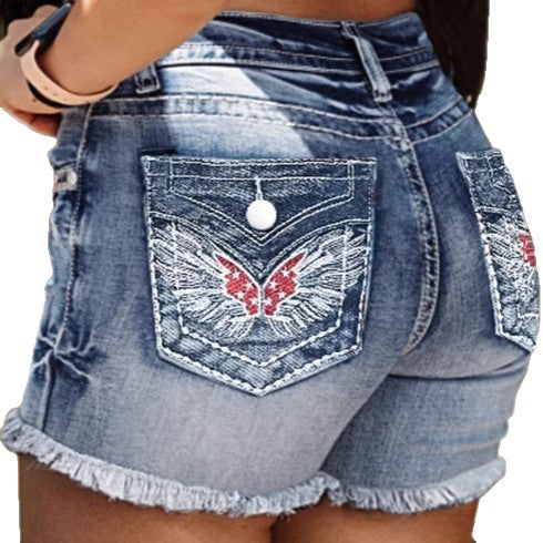 Dame Højskårne Jeansshorts med broderede vinge-motiver Stilla