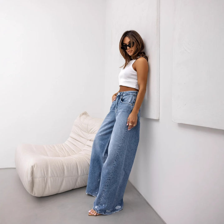 Dame bredde jeans i vintage-stil med høje lommer og trendy brugte effekter Stilla