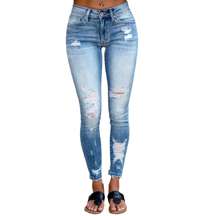 Dame skinny jeans i trendy destroyed look med høj talje og frynset kant