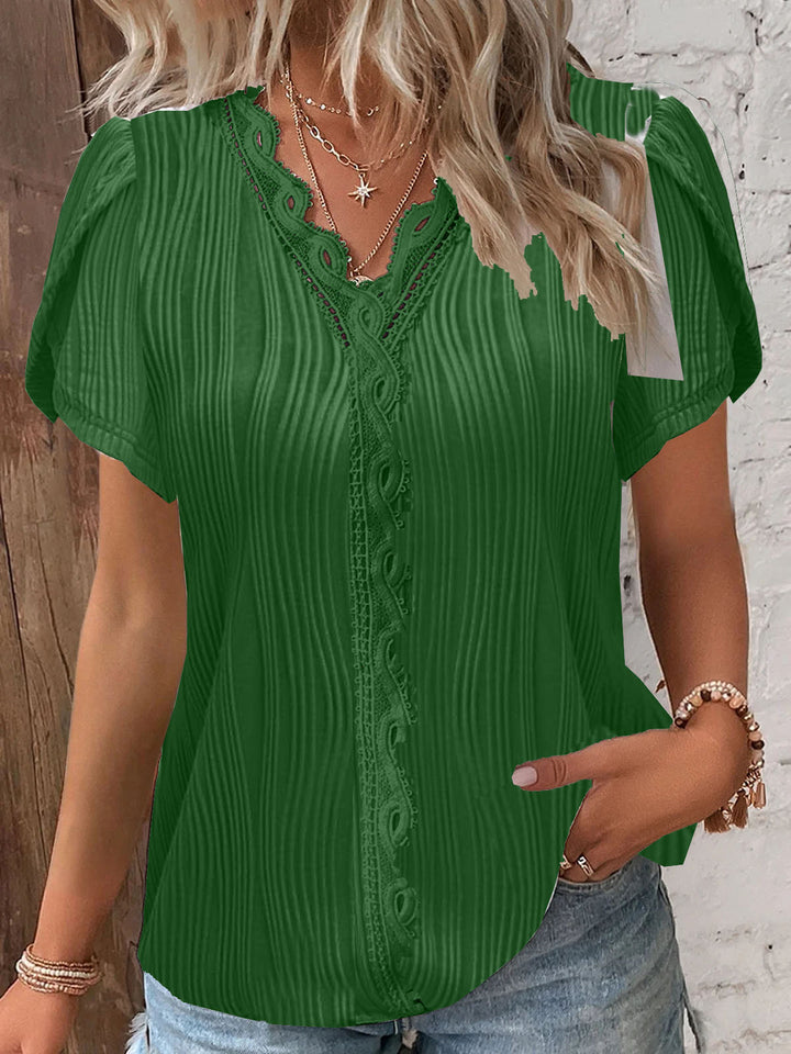 Damebluse med knapliste og spids Stilla