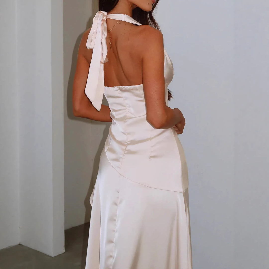 Dame elegant viklekjole med asymmetrisk snit og halterhals Skovae