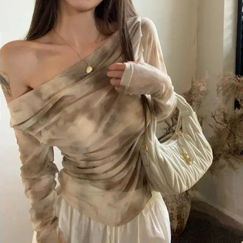Kvindernes elegante langærmede top med samlet design Stilla